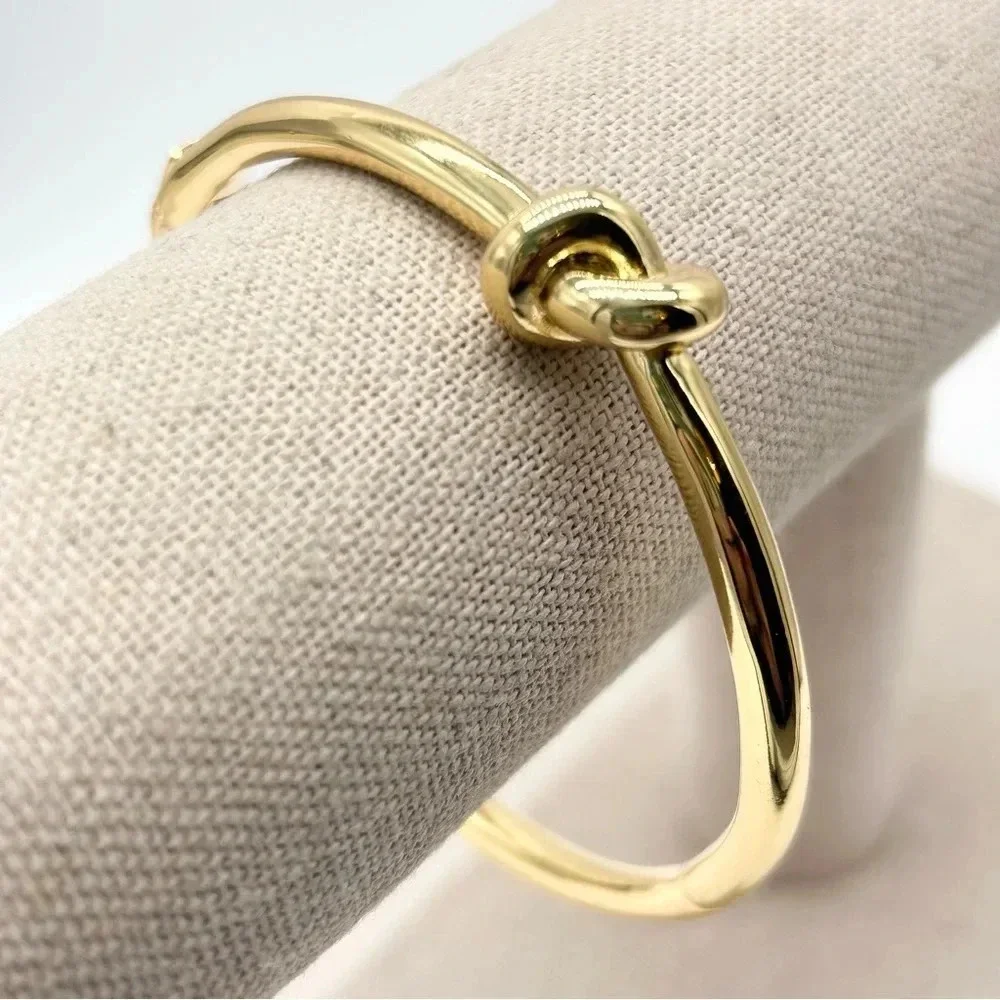 Kate Spade Sailor’s Knot Gold Hinged Bangle